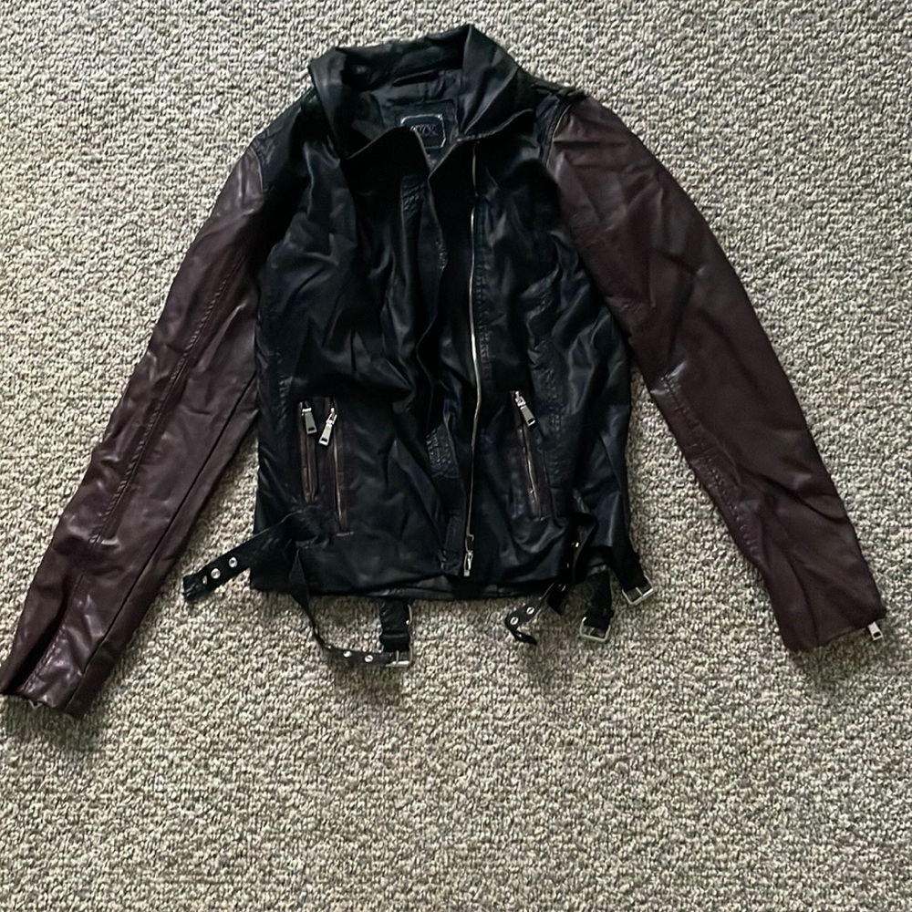 Amazing leather jack with zippers & buckles! Great quality!